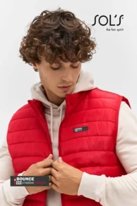 branded bodywarmers featuring multi-colour chest logos for corporate staff workwear and winter uniforms.