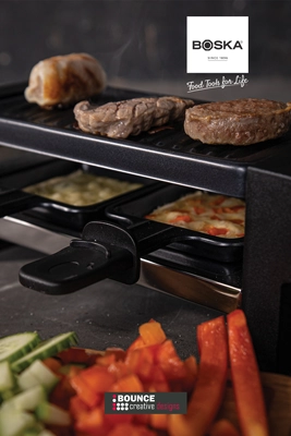 BOSKA Gourmet Raclette Mini set styled for a cosy winter evening, available for custom holiday branding from Bounce Creative Designs.