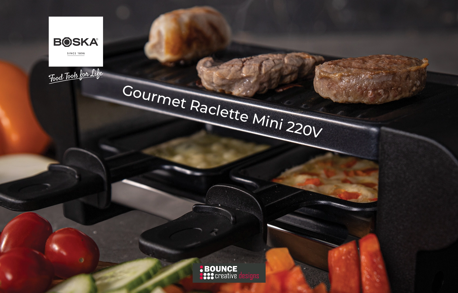 BOSKA Gourmet Raclette Mini set styled for a cosy winter evening, available for custom holiday branding from Bounce Creative Designs.