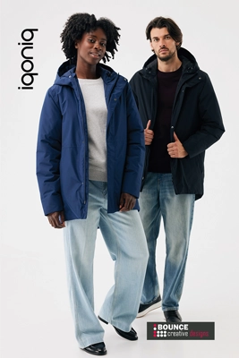 Team members wearing the custom embroidered recycled winter parka from Bounce Creative Designs, featuring multi-colour chest and back branding.