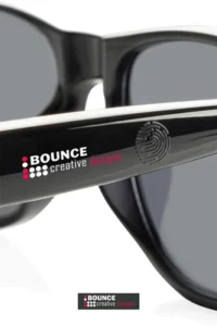 Branded AI smart glasses outdoors while managing an outdoor corporate event, available from Bounce Creative Designs.