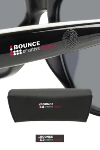 Branded AI smart glasses outdoors while managing an outdoor corporate event, available from Bounce Creative Designs.