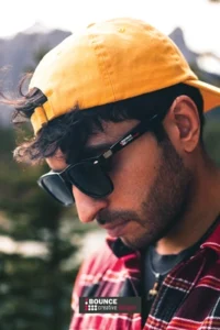 Branded AI smart glasses outdoors while managing an outdoor corporate event, available from Bounce Creative Designs.